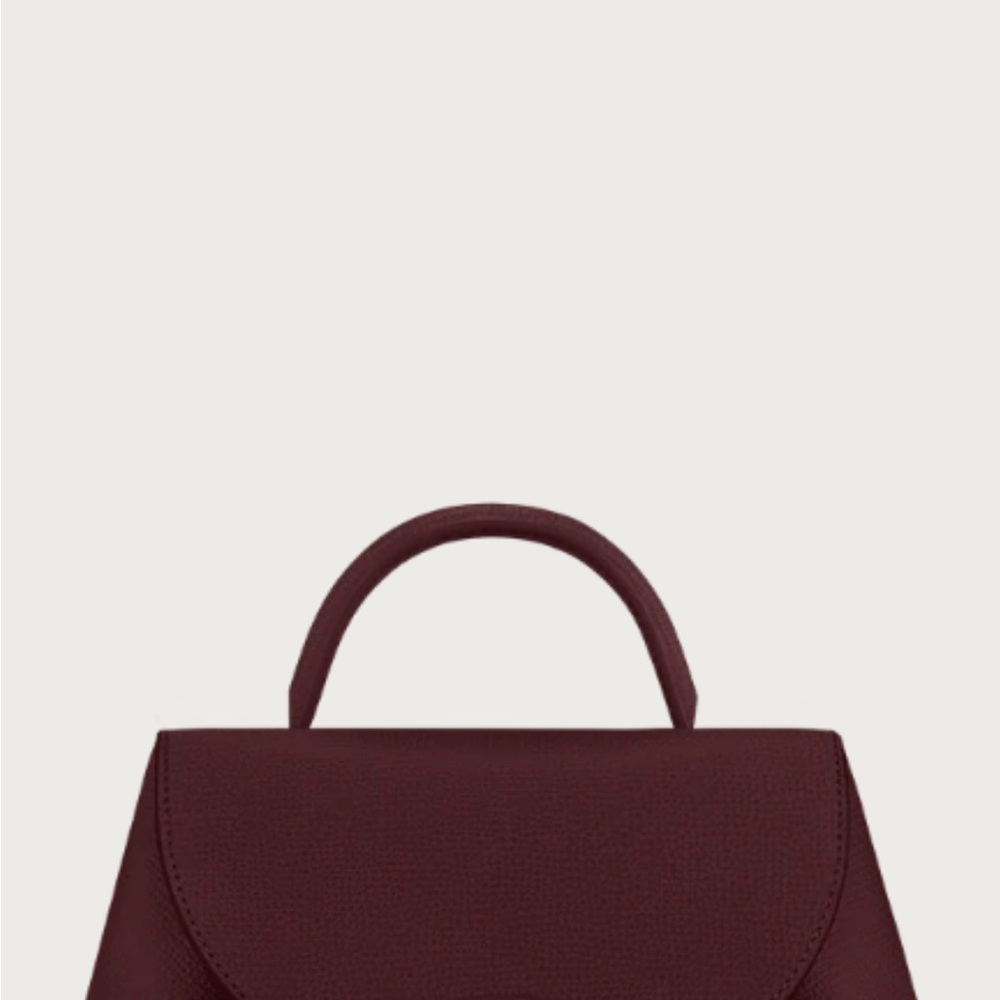 polene numero un nano textured leather handbag in burgundy